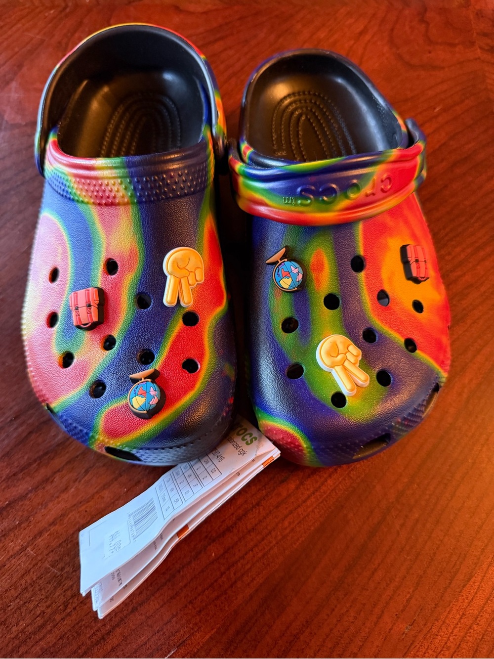 CROCS Kids Classic slip ons in Rainbow Swirl Multicolor